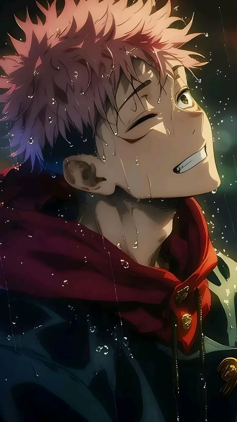 Yuji Itadori thường được mô tả với mái tóc hồng ngắn, ánh mắt kiên định và biểu cảm đầy nhiệt huyết